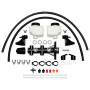Wilwood black remote tandem master kit laid out with two reservoirs, hoses, brackets, fittings and bleeding tubes