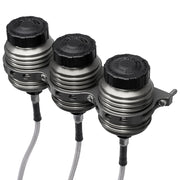 Wilwood installation example of three dark finned reservoirs on a bracket with attached fluid feed hoses