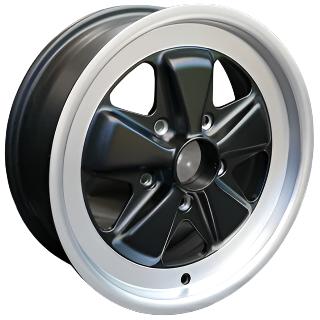 Maxilite introduces 6 x 16 Fuchs-style wheels for Porsche 911 Carrera, crafted with Swiss precision. These TÜV-certified wheels boast a 3-year warranty and classic five-spoke design, combining lightweight forged aluminum with a black-accented look. Specifications: 5 x 130mm bolt circle, 36mm offset, 71.6mm centerbore.