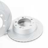 Rennline OE+ Rear Brake Rotor Pair for Cayenne: Vented, slotted rotors with GEOMET coating for heat dissipation & rust resistance. Shop now at PMB Performance.
