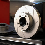 Rennline OE+ Front Brake Rotor Pair: High-performance rotors with heat dissipation, rust protection, and enhanced stopping power. Shop now at PMB Performance.