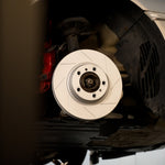 Rennline OE+ Front Brake Rotor Pair for Cayenne: Vented, slotted rotors with GEOMET coating for heat dissipation & rust resistance. Shop now at PMB Performance.