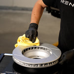 Rennline OE+ Left Rear Brake Rotor for Macan: Vented, slotted rotors with GEOMET coating for heat dissipation. Shop now at PMB Performance.