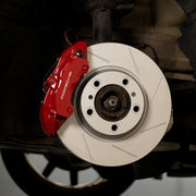 Rennline OE+ Front Brake Rotors for Macan (2017-21): Vented, slotted rotors with GEOMET coating for heat dissipation. Shop now at PMB Performance.