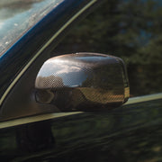 Rennline Carbon Fiber Mirrors for Cayenne: Sleek, durable carbon fiber upgrade with perfect OEM fit and easy installation. Shop now at PMB Performance.