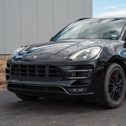 Rennline Carbon Fiber "Mustache" Front Lip for Macan: Hand-laid carbon fiber, high-gloss UV finish, OEM+ fit, & easy installation. Shop now at PMB Performance.