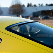 Rennline Carbon Fiber Roof Spoiler: Upgrade your 987 with a hand-laid carbon fiber spoiler for a perfect OEM+ fit. Shop now at PMB Performance.