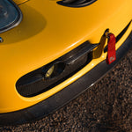 Rennline Carbon Fiber Fog Light Bezels: Upgrade your 987 with hand-laid carbon fiber bezels for a perfect OEM+ fit. Shop now at PMB Performance.