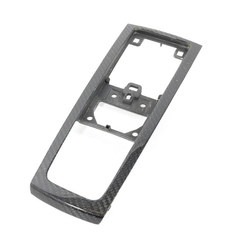 Rennline Carbon Fiber Center Console Surround for Macan: High-quality carbon fiber trim for a sleek, OEM-fit upgrade. Easy install. Shop now at PMB Performance.