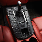 Rennline Carbon Fiber Center Console Surround for Macan: High-quality carbon fiber trim for a sleek, OEM-fit upgrade. Easy install. Shop now at PMB Performance.
