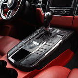 Rennline Carbon Fiber Center Console Surround for Macan: High-quality carbon fiber trim for a sleek, OEM-fit upgrade. Easy install. Shop now at PMB Performance.
