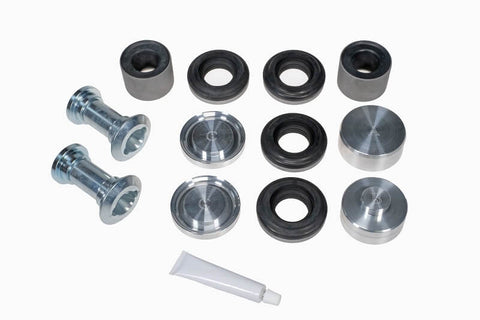 Porsche 964 Rear Trailing Arm Bushings Kit, Stiffer Rubber, Includes Bushings, Aluminum Centers, Tools, Sold as Set. Shop now at PMB Performance.
