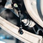 Rennline Adjustable Lift Links for Macan: Easy install, adjustable height up to 2" for air suspension models. Durable construction. Shop now at PMB Performance.