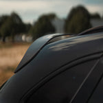 Rennline Carbon Fiber Hatch Spoiler for Macan: Hand-laid carbon fiber with UV gloss finish, OEM+ fit, easy install.  Shop now at PMB Performance.