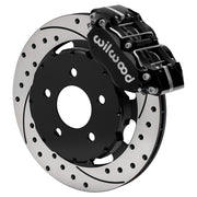 Wilwood front black Narrow Dynapro caliper beside an 11.75-inch drilled/slotted rotor, angled assembly for Mustang Pro-Street disc spindle