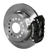 Wilwood rear black Dynalite caliper beside a 12.19-inch plain-face rotor, angled assembly for C10 2.42-inch-offset parking brake