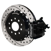 Wilwood rear black CPB caliper beside a 12.88-inch drilled/slotted rotor, angled assembly for S2000 rear parking-caliper setup
