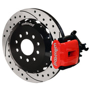 Wilwood rear red CPB caliper beside a 12.88-inch drilled/slotted rotor, angled assembly for S2000 rear parking-caliper setup