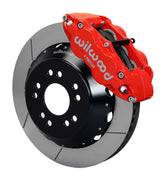 Wilwood front red Superlite 6R caliper beside a 14.00-inch slotted rotor, angled assembly for Corvette C2/C3 front big-brake layout