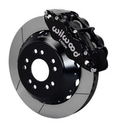 Wilwood front black Superlite 6R caliper beside a 14.00-inch slotted rotor, angled assembly for Corvette C2/C3 front big-brake layout