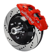 Wilwood front red AERO6 caliper beside a 14.00-inch drilled/slotted rotor, angled assembly for ProSpindle AERO6 mounting