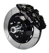 Wilwood front black AERO6 caliper beside a 14.00-inch slotted rotor, angled assembly for ProSpindle AERO6 mounting