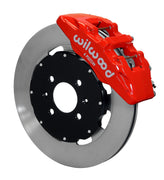 Wilwood front red Dynapro 6 caliper beside a 12.19-inch plain-face rotor, angled assembly for Honda 240 mm factory spindle