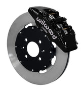 Wilwood front black Dynapro 6 caliper beside a 12.19-inch plain-face rotor, angled assembly for Honda 240 mm factory spindle