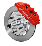 Wilwood front red Dynapro 6 caliper beside a 12.19-inch plain-face rotor, angled assembly for GM 11-inch-spindle Dynapro conversion