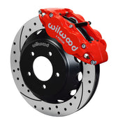 Wilwood RX-7 Front Brakes, Red 14-Inch Six-Piston SRP Kit, angled red caliper and drilled/slotted rotor assembly