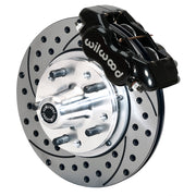 Wilwood Chevy Drum-Spindle Front Brake Kit, 11-Inch SRP Rotors, angled black caliper and drilled/slotted rotor assembly