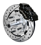 Wilwood front Forged Dynalite Internal kit for GMC/Buick/Chevrolet/Oldsmobile/Pontiac/Isuzu disc spindle: black caliper and 12.19-inch drilled and slotted rotor in assembled view