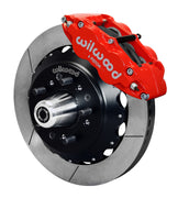 Wilwood front Forged Narrow Superlite 6R kit for GMC/Buick/Chevrolet/Oldsmobile/Pontiac/Isuzu disc spindle: red caliper and 12.88-inch slotted rotor in assembled view