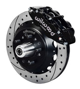Wilwood front Forged Narrow Superlite 6R kit for GMC/Buick/Chevrolet/Oldsmobile/Pontiac/Isuzu disc spindle: black caliper and 14.00-inch drilled and slotted rotor in assembled view
