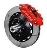 Wilwood front Forged Narrow Superlite 6R kit for Chevrolet drum spindle: red caliper and 14.00-inch slotted rotor in assembled view