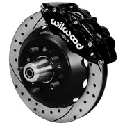 Wilwood front Forged Narrow Superlite 6R kit for Ford/Mercury disc spindle drum spindle: black caliper and 12.88-inch drilled and slotted rotor in assembled view