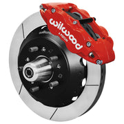 Wilwood front Forged Narrow Superlite 6R kit for Ford/Mercury disc spindle drum spindle: red caliper and 12.88-inch slotted rotor in assembled view