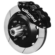Wilwood front Forged Narrow Superlite 6R kit for Ford/Mercury disc spindle drum spindle: black caliper and 12.88-inch slotted rotor in assembled view