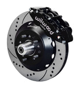 Wilwood front Forged Narrow Superlite 6R kit for Ford/Mercury disc spindle drum spindle: black caliper and 14.00-inch drilled and slotted rotor in assembled view