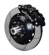 Wilwood front Forged Narrow Superlite 6R kit for Ford/Mercury disc spindle drum spindle: black caliper and 14.00-inch slotted rotor in assembled view