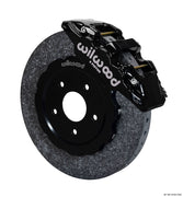 Wilwood Corvette-style carbon-ceramic front single-side assembly with a black AERO6 caliper beside the carbon-ceramic rotor