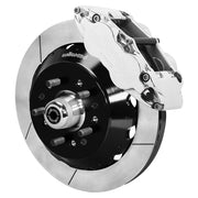 Wilwood TCI IFS front single-side assembly showing a polished Superlite 6R caliper beside a 12.88-inch slotted rotor ring and protruding wheel studs