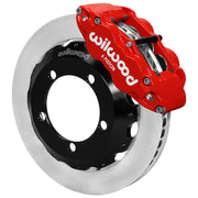 Wilwood Bronco Dana 30/44 drum-spindle front single-side assembly showing a red Superlite 6R caliper beside a 12.88-inch plain-face rotor
