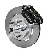 Wilwood Ford and Mercury spindle front single-side assembly showing a black Dynapro dust-boot caliper beside a 12.19-inch plain-face rotor and protruding wheel studs