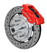 Wilwood AMC Kelsey-Hayes spindle front single-side assembly with a red Forged Dynalite Internal caliper beside the drilled-and-slotted rotor and protruding wheel studs