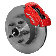 Wilwood later Ford/Mercury front Dynalite-M brake kit assembly example, showing a red caliper positioned over the plain-face rotor/hub