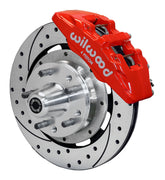 Wilwood AMC front Dynapro 6 brake kit assembly example, showing a red caliper, drilled and slotted rotor and wheel hub