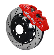Wilwood BMW front AERO6 brake kit assembly example, showing a red caliper positioned over the drilled and slotted rotor and mounting hat