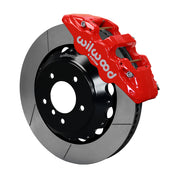 Wilwood BMW front AERO6 brake kit assembly example, showing a red caliper positioned over the slotted rotor and mounting hat