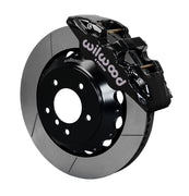 Wilwood BMW front AERO6 brake kit assembly example, showing a black caliper positioned over the slotted rotor and mounting hat